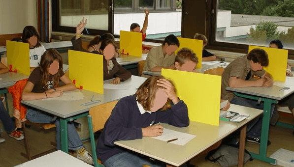 Privacy screens on school desks in a classroom