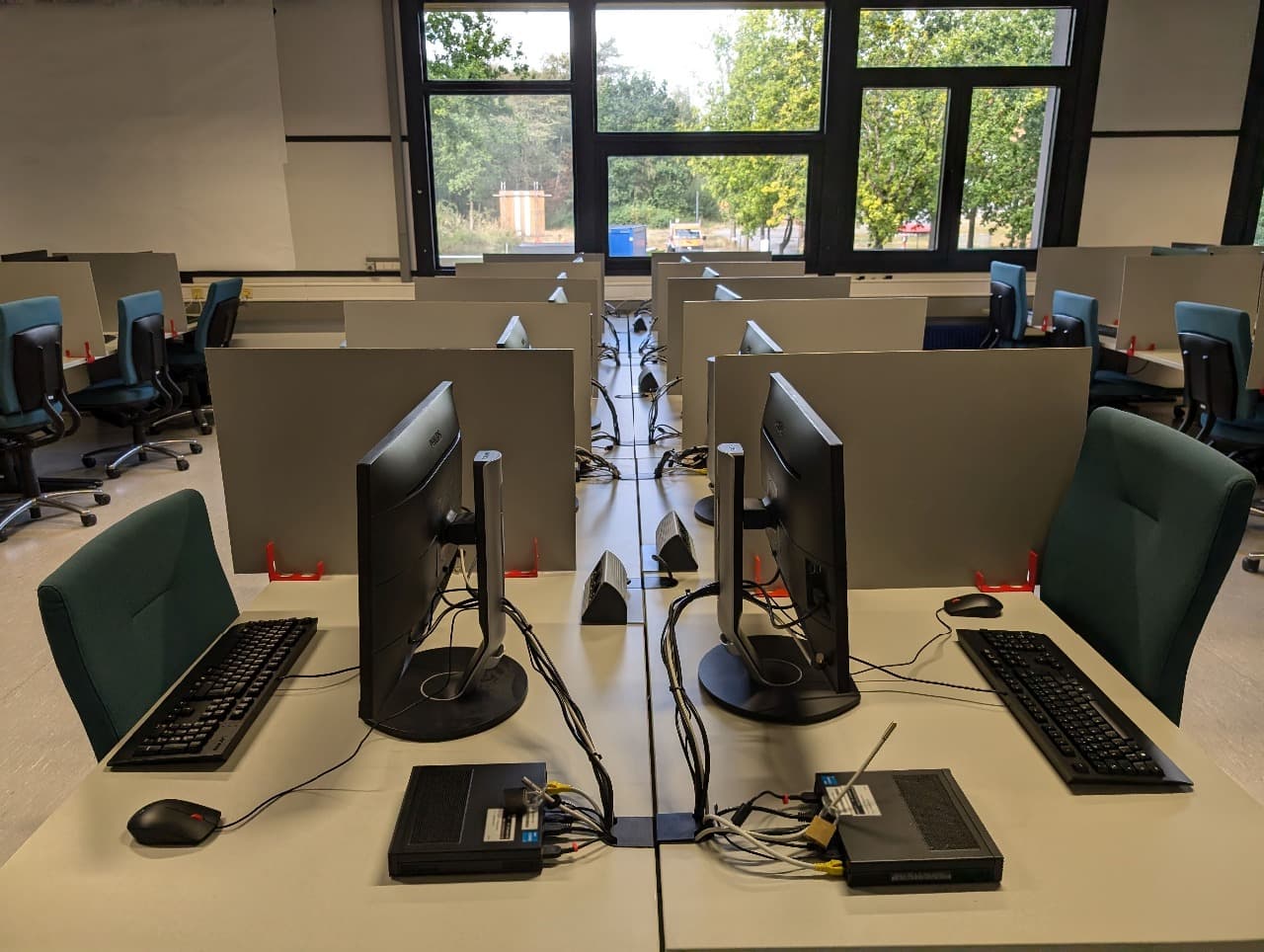 Desk dividers in a computer room